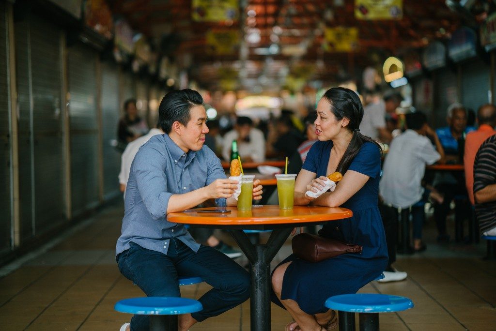 people dining in asian food market