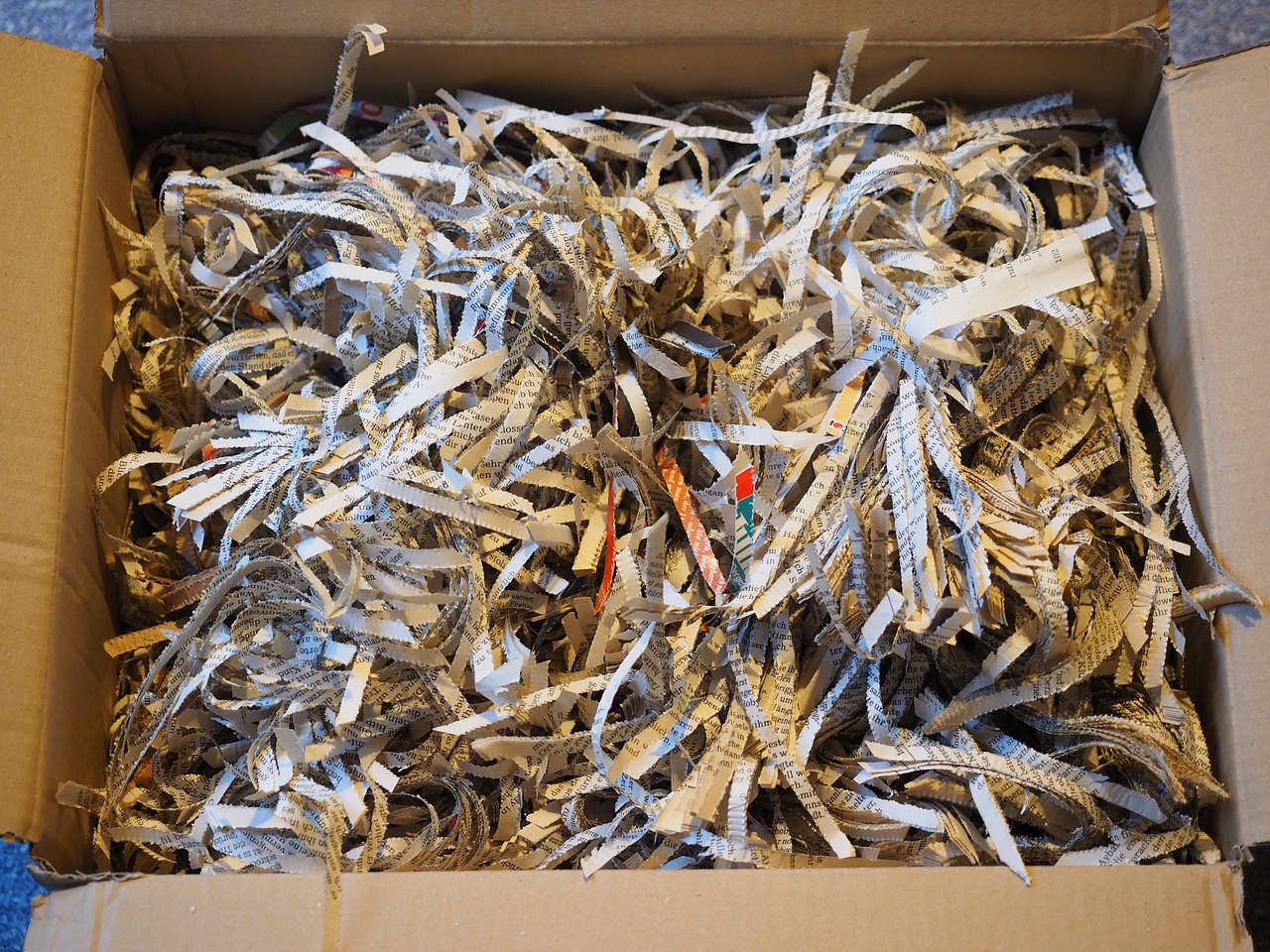 box full of shredded paper