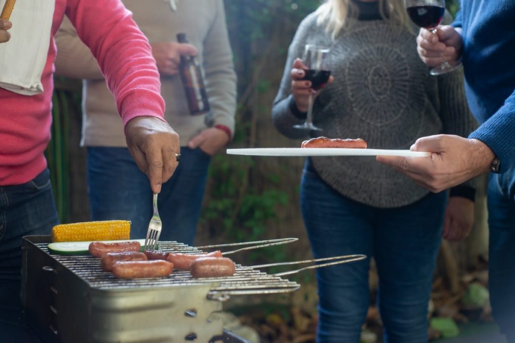 people around a grill