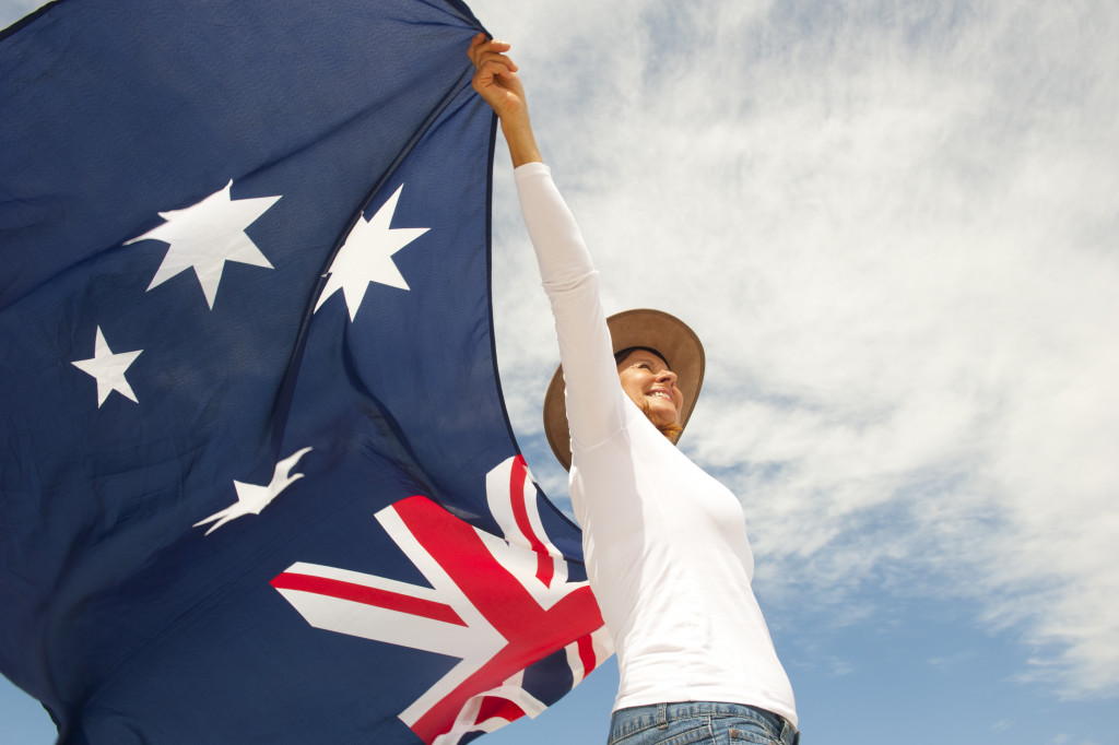 woman holding a flag of australia