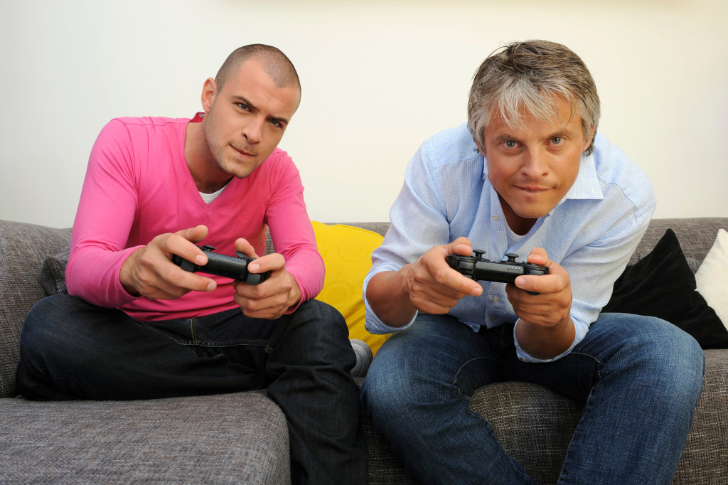 2 man playing video game