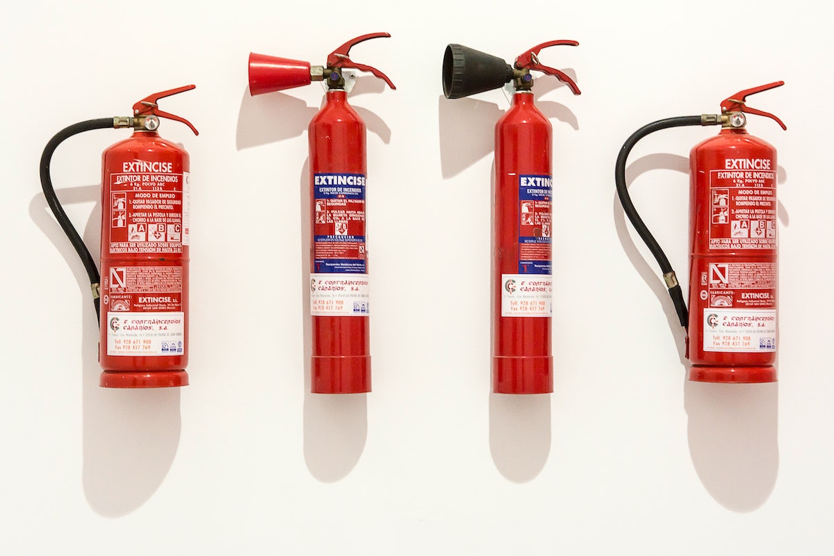 assorted fire extinguishers