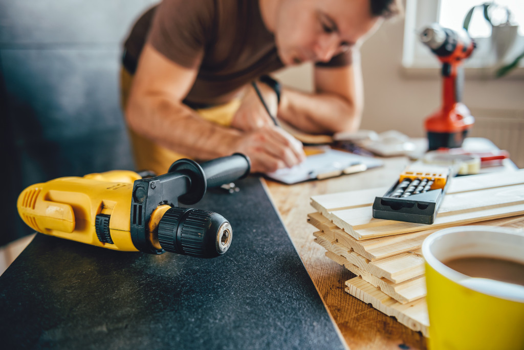 man with power tools and coffee